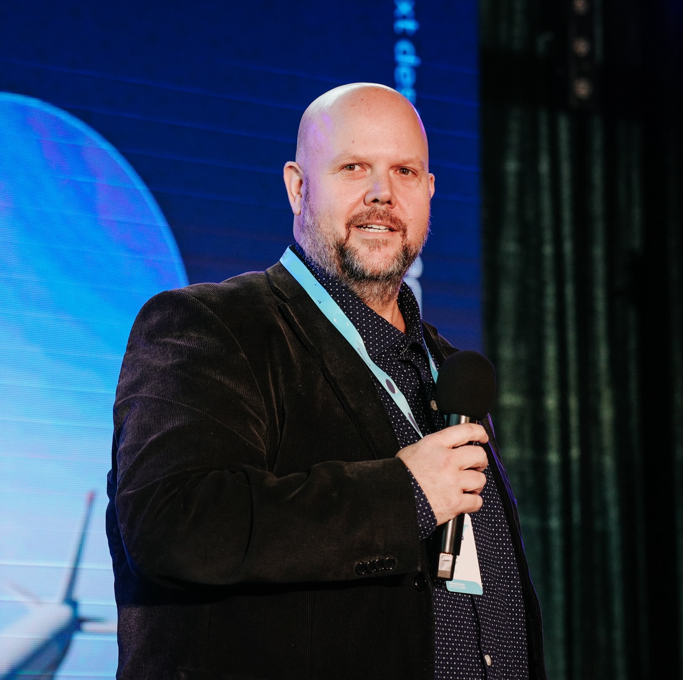Tim Boisvert speaking at a conference